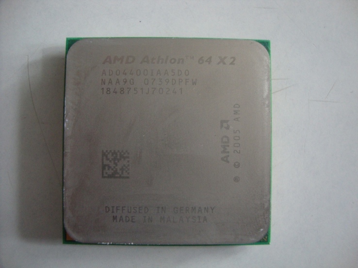 Процессор AMD Athlon 64х2 и две карты памяти под него, фото №2