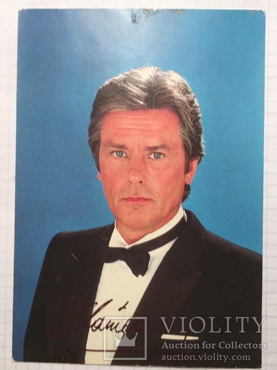 Autograph on the photo (postcard) of Alain Delon