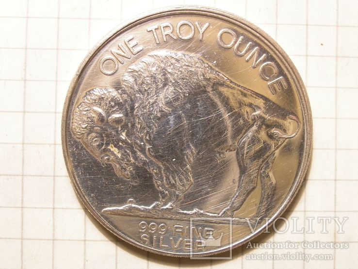 One troy ounce 999 fine silver. Слиток серебра 999.