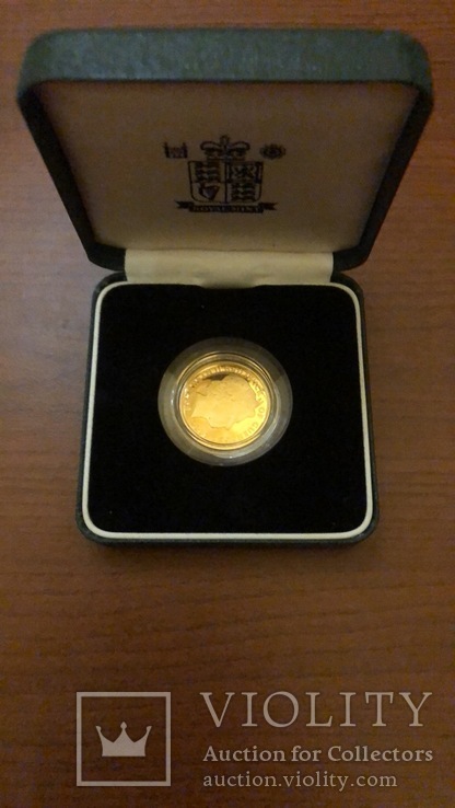 Золотая монета Великобритании(Остров Гернси)