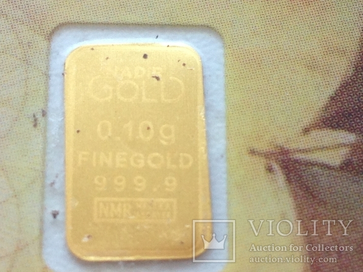 Пластиковая бона Karat Gold Cooperation PTE Ltd. с золотым слитком 0,1 гр., фото №2