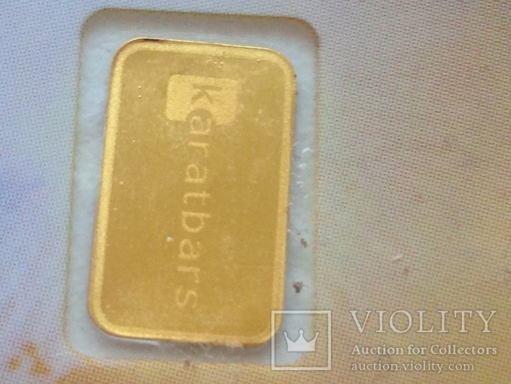 Пластиковая бона Karat Gold Cooperation PTE Ltd. с золотым слитком 0,1 гр., фото №3