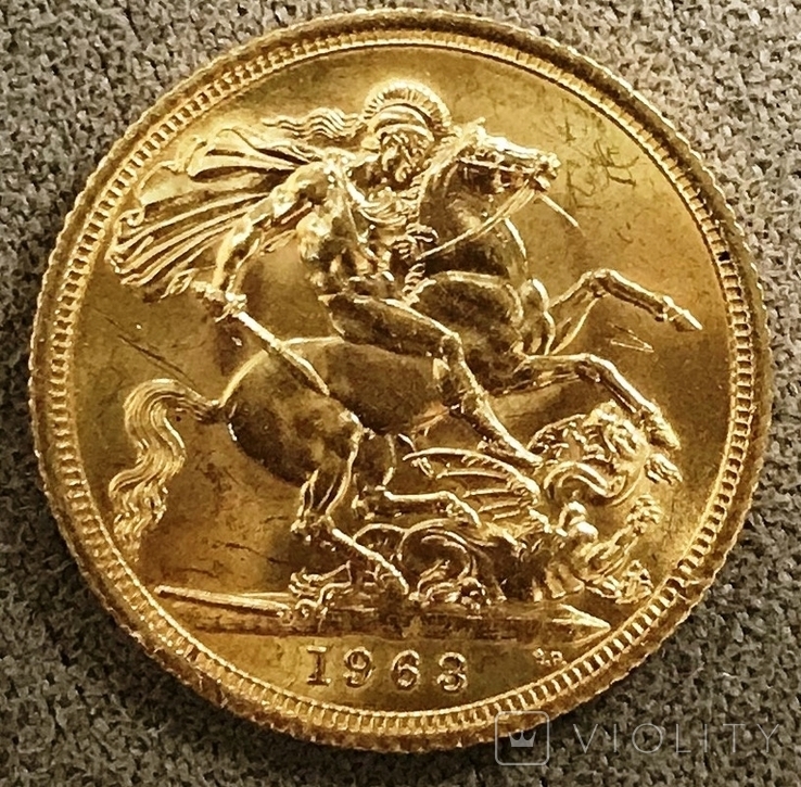 Золотая монета Великобритании 1 соверен 1963 г.