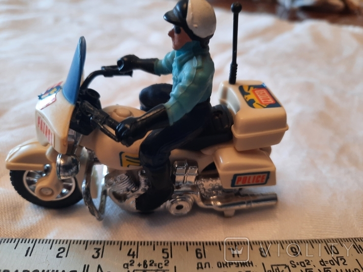 Полицейский на мотоцикле, фото №4