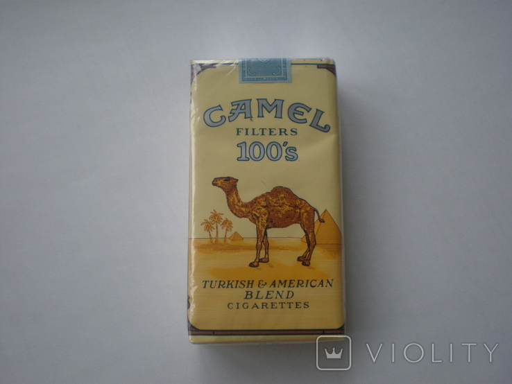 Camel коричневый сигареты. Camel 100 желтый сигареты. Сигареты кемал100 американские. Сигареты Camel Original. Сигареты кэмел 100.