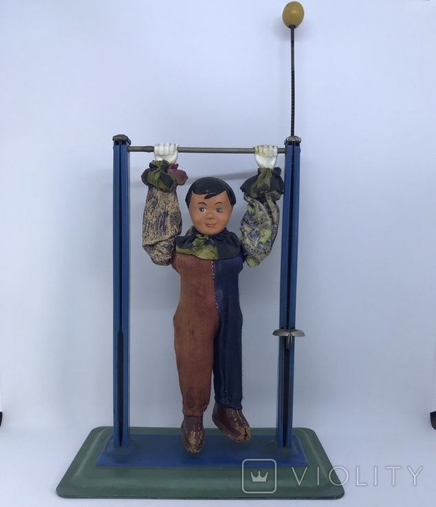 Механическая игрушка СССР клоун на перекладине, фото №2