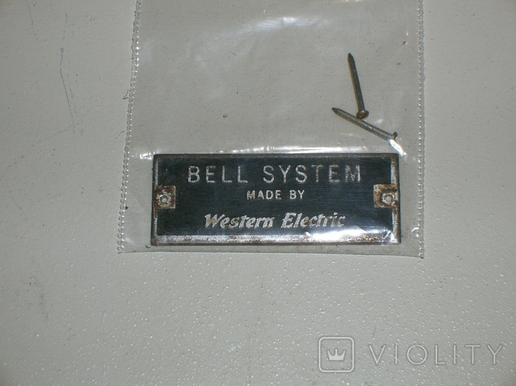 Шильдік Western Electric Bell system із звязкової апаратури 1940 років