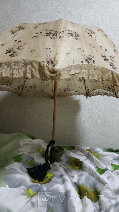 Старый зонт в родном пакете