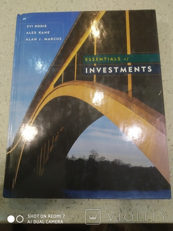 Книга на португальском язике Essentials of Investments, фото №2