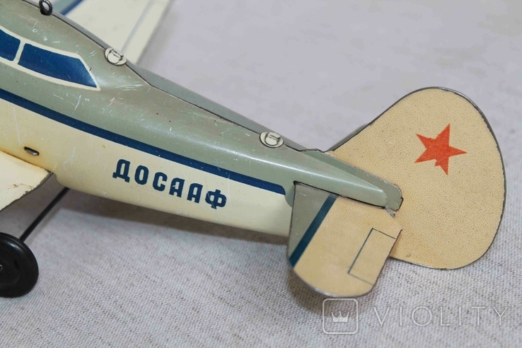 Самолёт ДОСААФ. Заводная игрушка СССР, фото №3
