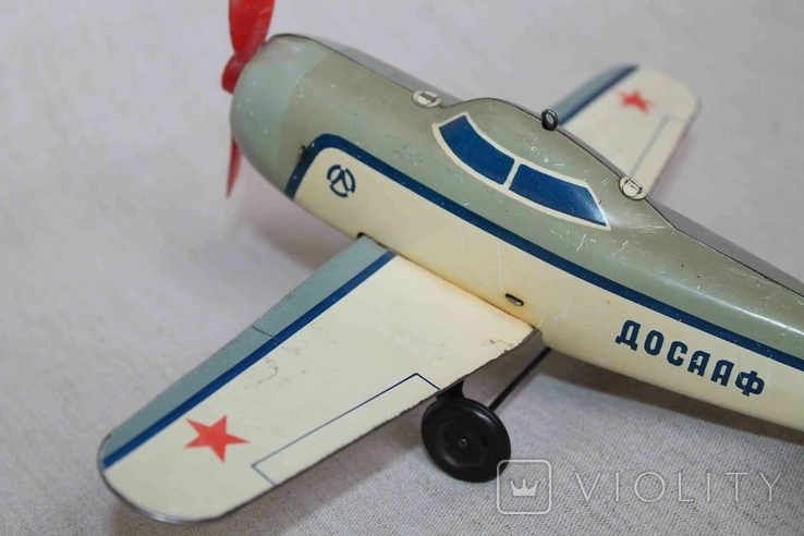 Самолёт ДОСААФ. Заводная игрушка СССР, фото №4