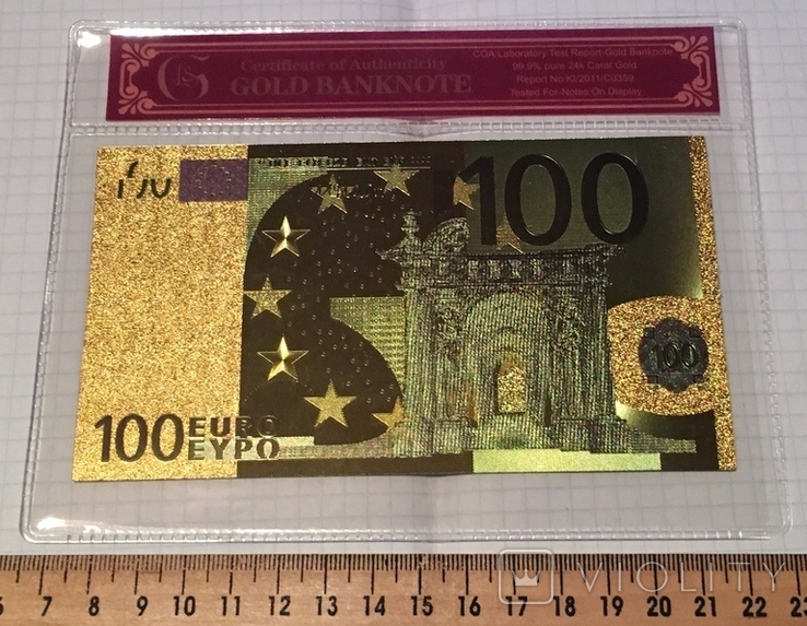 Gold souvenir banknote 100 Euro in a security file, envelope