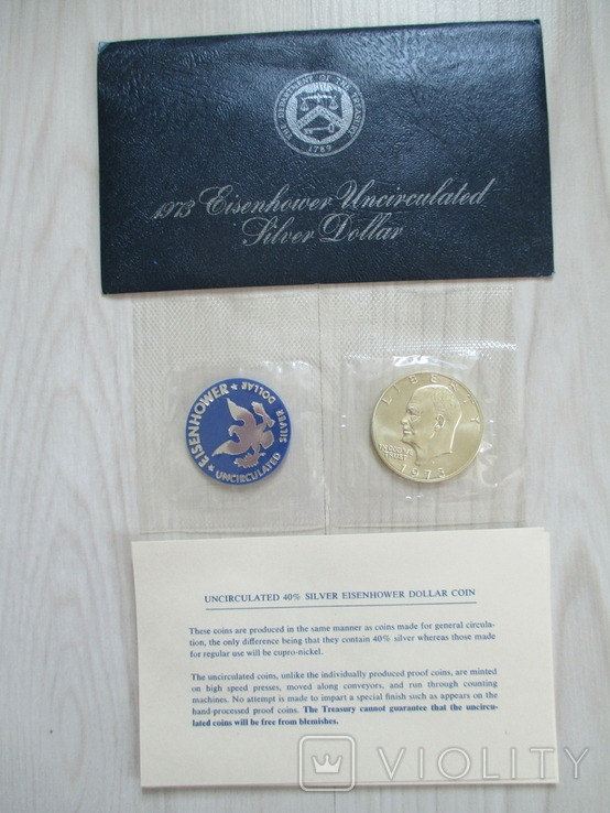 Доллар США 1973 год с жетоном мон.двора. В оригинальной упаковке.