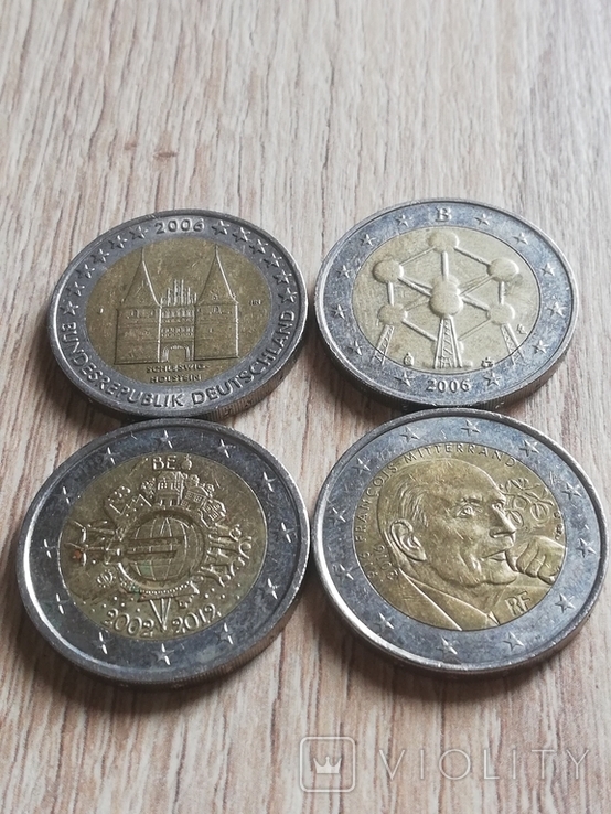 4 монеты номиналом 2 евро