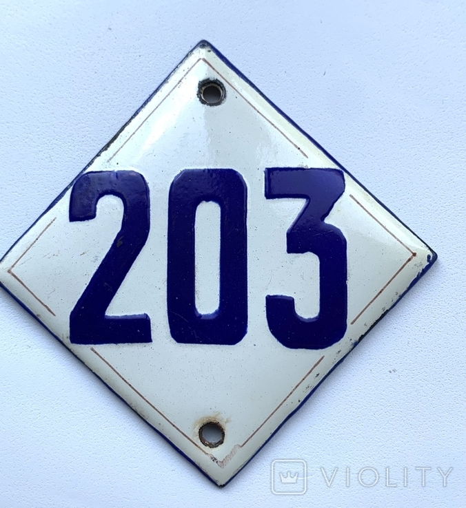Табличка номер с дверей 203.