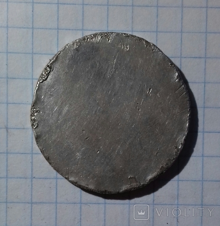 Срібна заготовка на монету