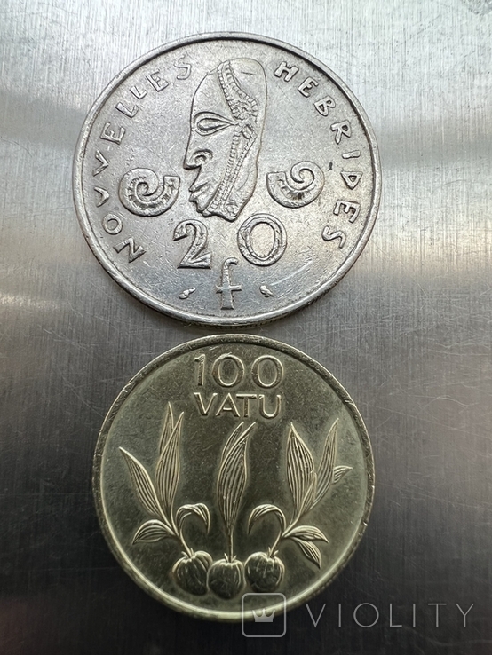 20 франков 1973 года Вануату ( Новые Гебриды)и 100 вату 1988 года, фото №5