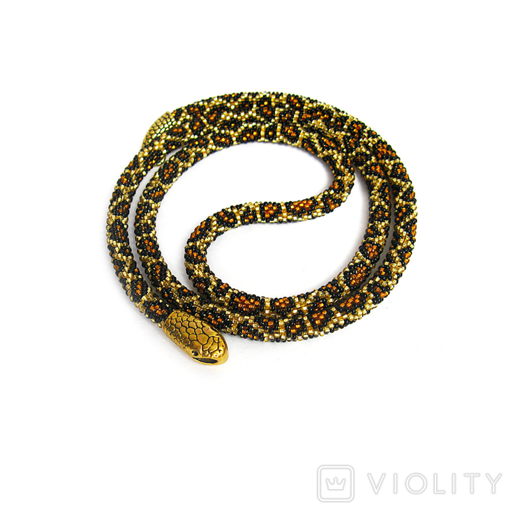 Handmade leopard-colored necklace in the shape of an Ouroboros snake. Predatory print, bright style, photo number 2