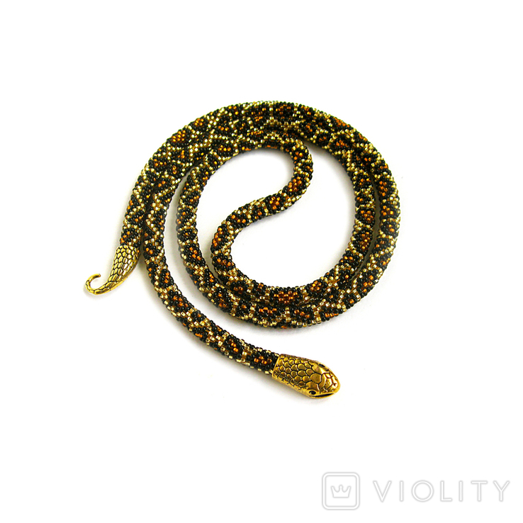 Handmade leopard-colored necklace in the shape of an Ouroboros snake. Predatory print, bright style, photo number 3