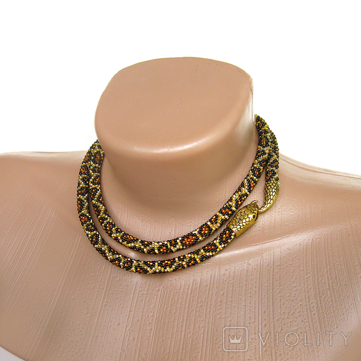 Handmade leopard-colored necklace in the shape of an Ouroboros snake. Predatory print, bright style, photo number 4