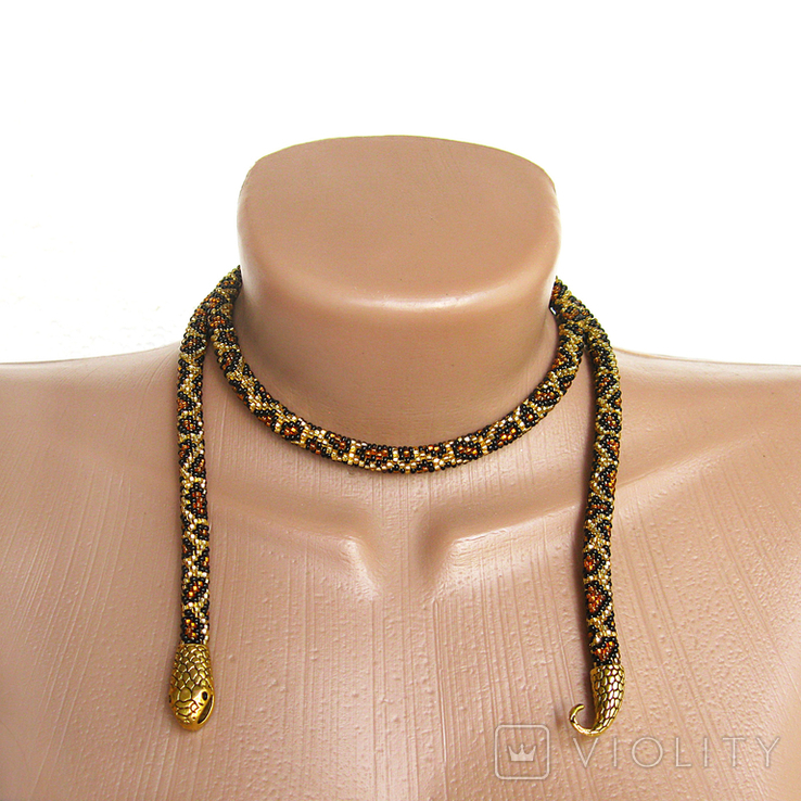 Handmade leopard-colored necklace in the shape of an Ouroboros snake. Predatory print, bright style, photo number 6