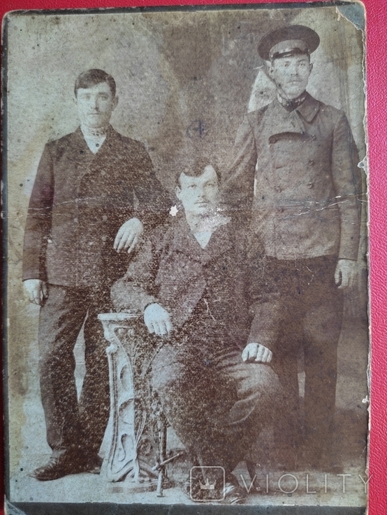 An old photograph of a group of men., photo number 4