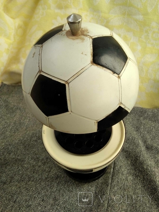 Cigarette holder soccer ball.