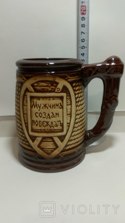 A clay mug with the inscription (A man is created to win), photo number 5