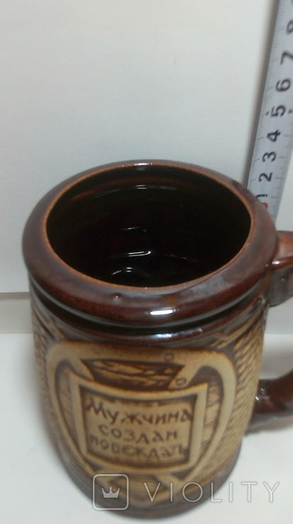 A clay mug with the inscription (A man is created to win), photo number 6