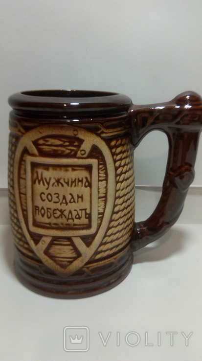 A clay mug with the inscription (A man is created to win), photo number 3