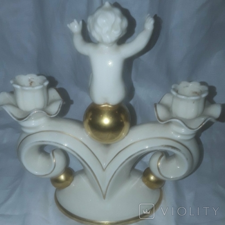 Candlestick for two candles, a child with a golden ball, photo number 3