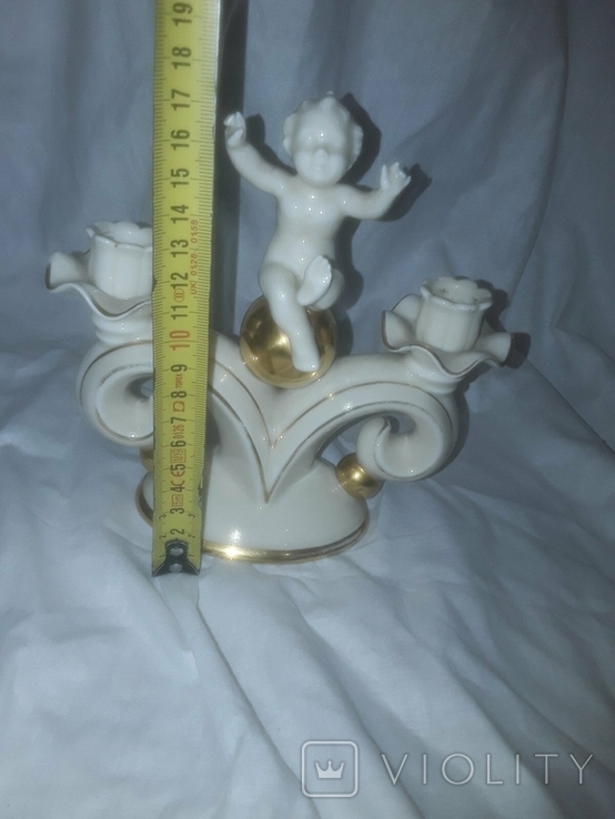 Candlestick for two candles, a child with a golden ball, photo number 6