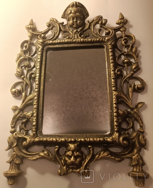 Cosmetic mirror in a bronze frame, photo number 6