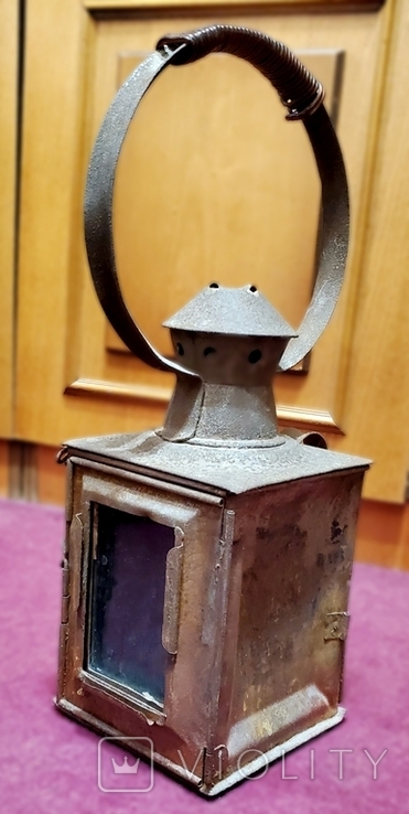 The railway lamp is old, possibly Soviet