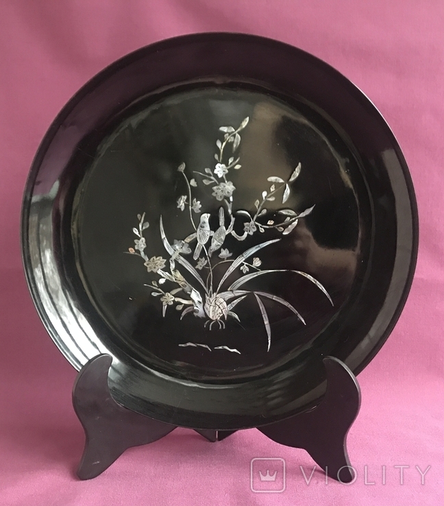 Decorative plate black and varnish with stand. Mother-of-pearl, tree.