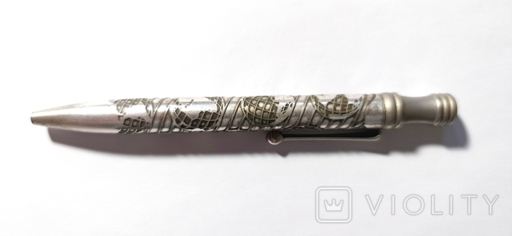 Długopis jest metalowy, ciężki. Grawerowanie w formie kuli ziemskiej, numer zdjęcia 6