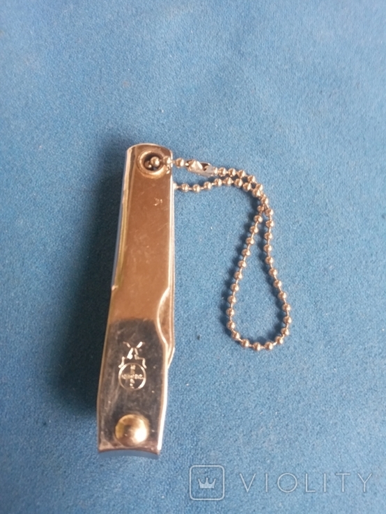 Keychain (knife, opener, nail clippers)., photo number 6