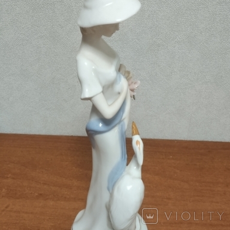 Figurine Girl with a stork., photo number 6