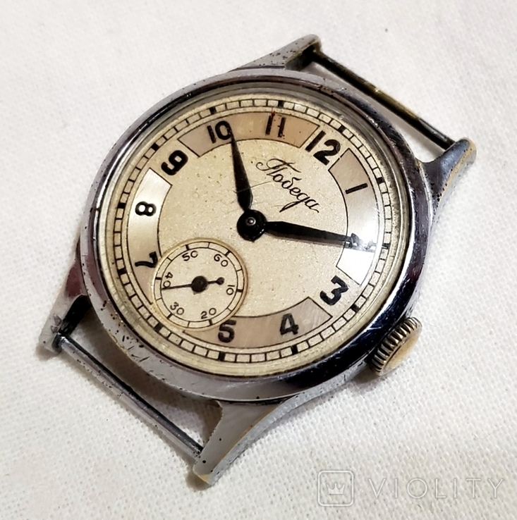 Watch Pobeda 1MChZ named after Kirov in 1950 in a chrome case of the USSR