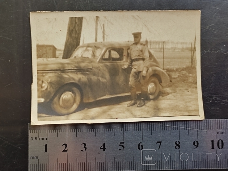 An old photo of an SA sergeant with a captured Opel Kapitan car., photo number 3