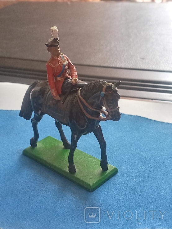 A girl in a military dress uniform on a horse (England)., photo number 2