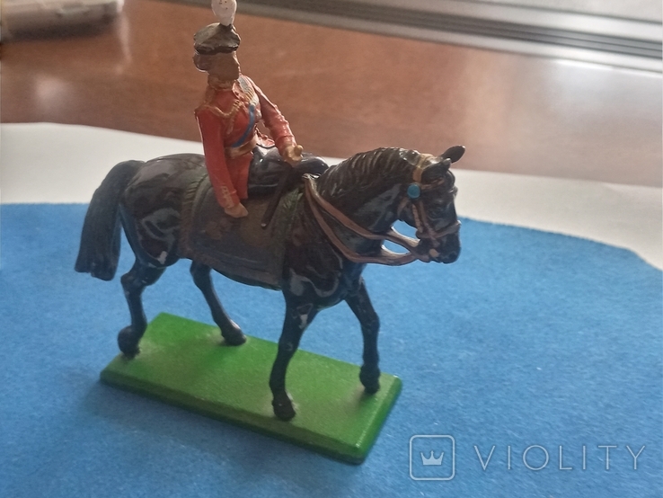 A girl in a military dress uniform on a horse (England)., photo number 3
