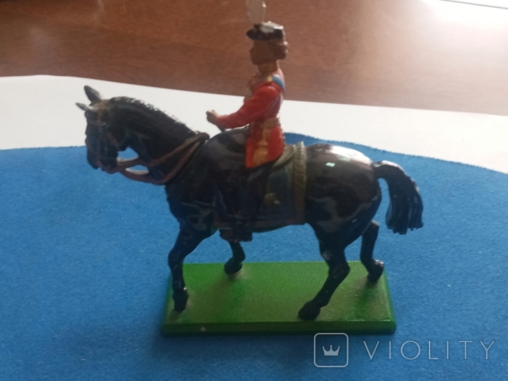 A girl in a military dress uniform on a horse (England)., photo number 5