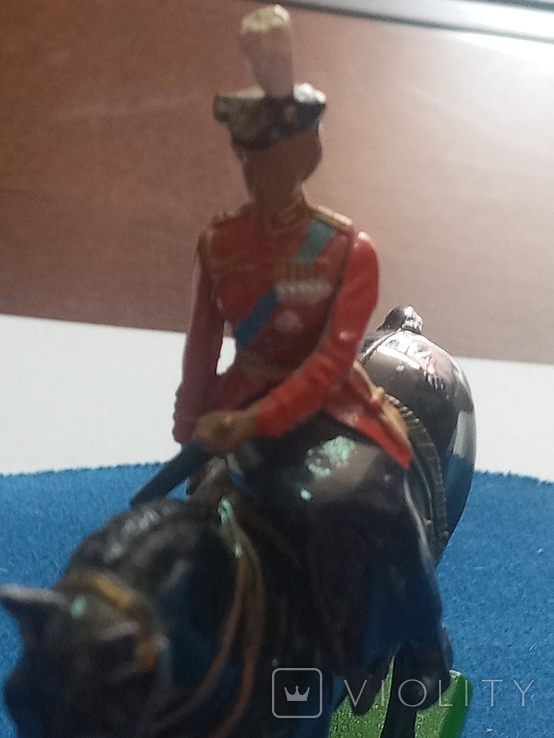 A girl in a military dress uniform on a horse (England)., photo number 7