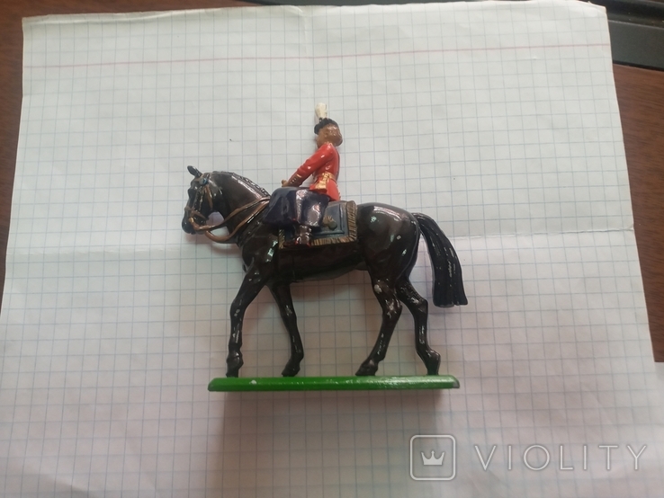 A girl in a military dress uniform on a horse (England)., photo number 12
