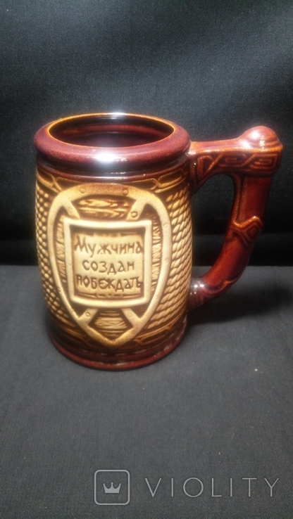 A clay mug with the inscription (A man is created to win), photo number 2