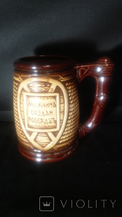 A clay mug with the inscription (A man is created to win), photo number 13