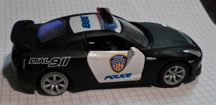 Машинку Kismart NISSAN GT-R 2009 R35 POLICE, фото №5