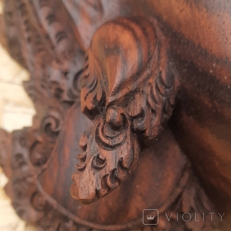 Деревянная маска с изображением божества, фото №12