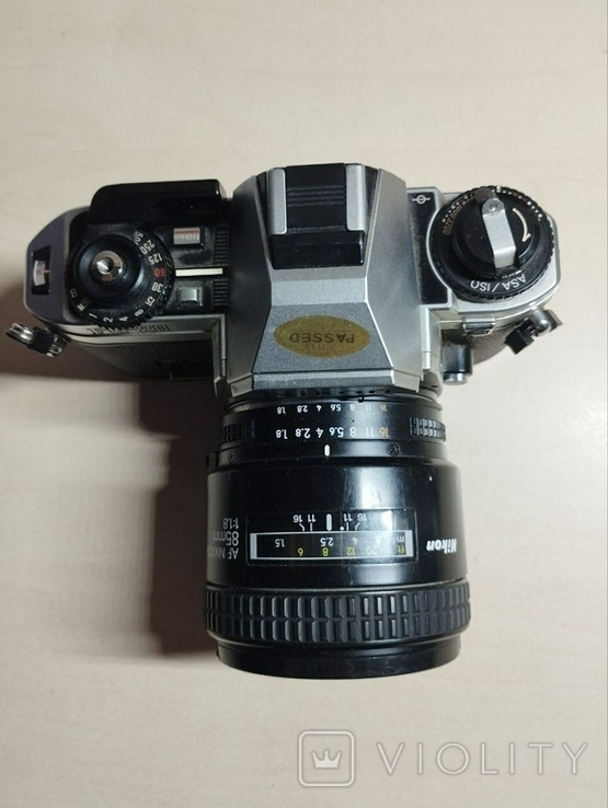 Фотоаппарат Nikon FG-20 плюс обьектив Nikon 1.8 85 mm (114900232 